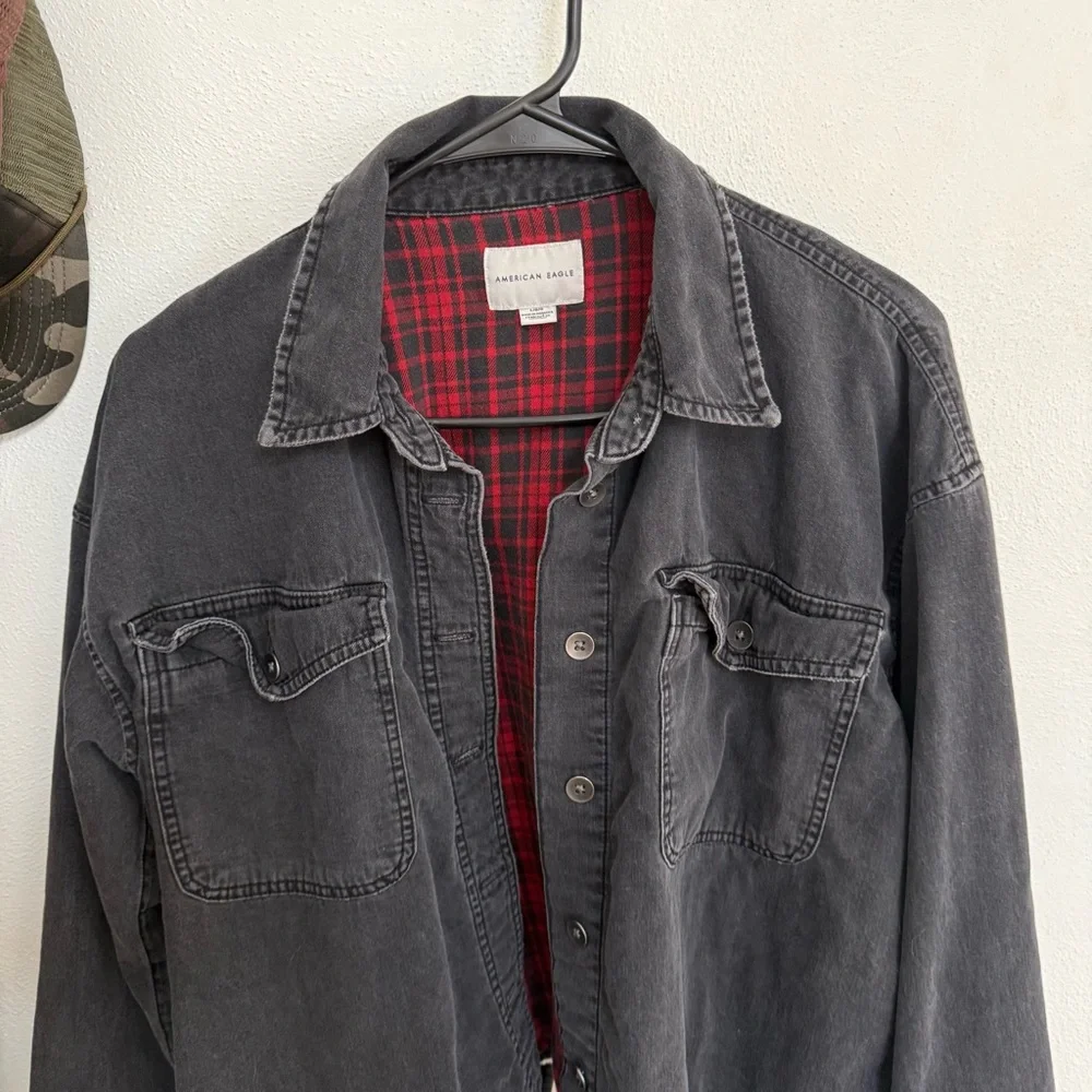 American Eagle Outfitters Distressed Black Jacket with Red Plaid Interior